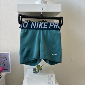 Nike Teal Athletic Shorts with White Logo